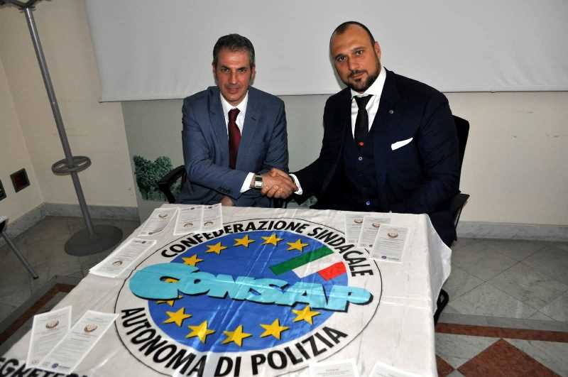 Nella foto il Segretario Generale della CONSAP di Roma GUERRISI con il Presidente Nazionale U.P.T.M. Avv U.E. CALVO